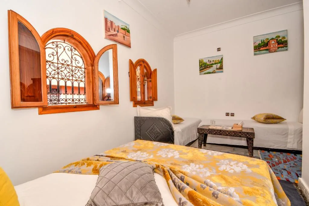 Habitación Doble Deluxe con Cama Adicional 9